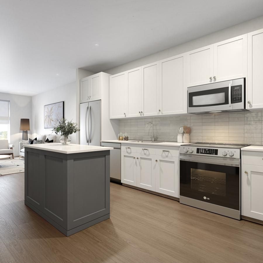 a kitchen with white cabinets